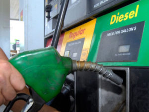 Hand holding diesel gas pump